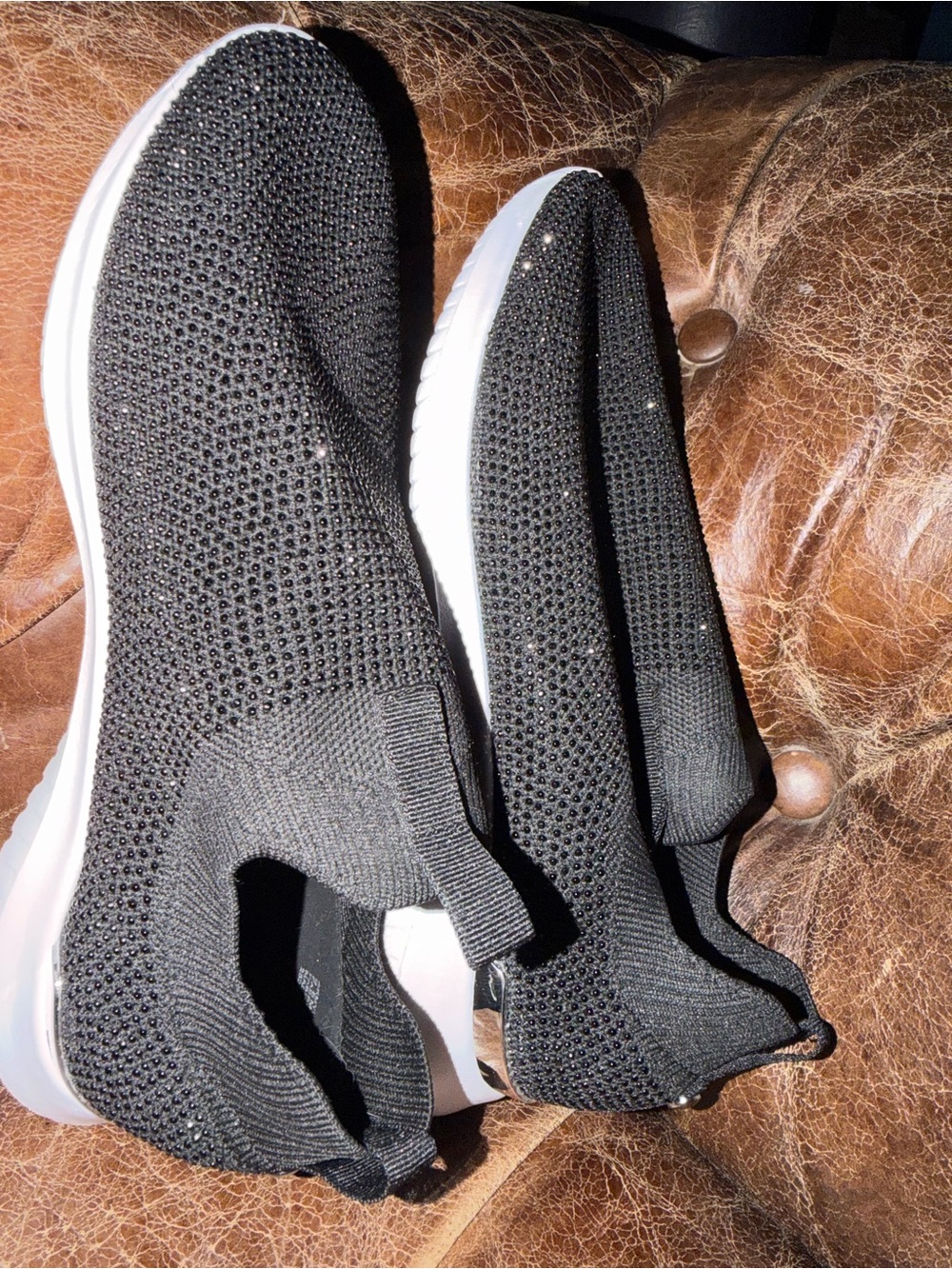 Black Slip-On Knit Sneakers with Rhinestone Detail Anne Klein